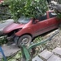 Kolkata: Mangled remains of a car after a tree fell on it, in the aftermath of Cyclone Amphan. (PTI)