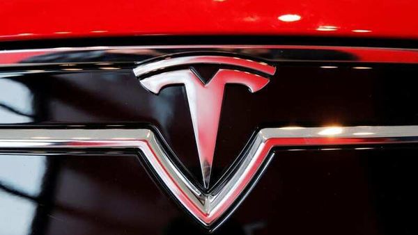 File photo: A Tesla logo on a Model S is photographed inside of a Tesla dealership in New York. (REUTERS)