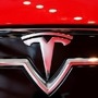 File photo: A Tesla logo on a Model S is photographed inside of a Tesla dealership in New York. (REUTERS)