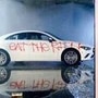 Vandalized cars sit in a Mercedes-Benz of Oakland showroom during in Oakland, California. (AP)
