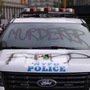 A rose stalk lies on a vandalized New York Police Department vehicle as protesters rally against the death in Minneapolis police custody of George Floyd in Manhattan, New York, (REUTERS)