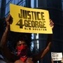 Protesters march at a rally against the death in Minneapolis police custody of George Floyd, in Houston, Texas, US