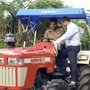 MS Dhoni riding a Swaraj 963 FE tractor at his hometown Ranchi. (Photo courtesy: Twitter/@ChennaiIPL)