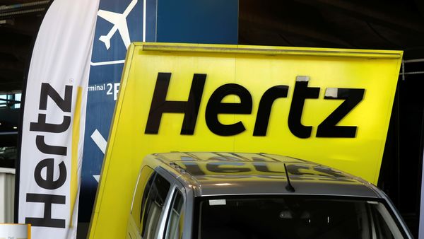 Logos of car rental company Hertz are seen outside Paris Charles de Gaulle airport in Roissy-en-France. (REUTERS)