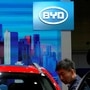 FILE PHOTO: Men clean a BYD electric vehicle (EV) e2 displayed during the media day for Shanghai auto show in Shanghai, China April 17, 2019. REUTERS/Aly Song/File Photo (REUTERS)