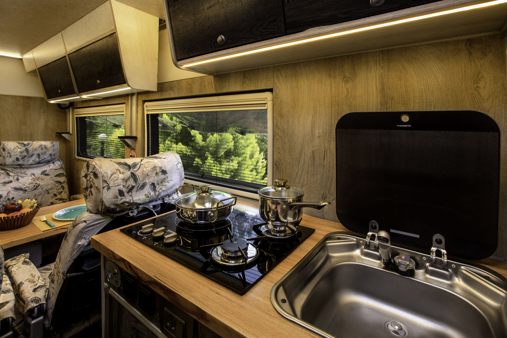 A view of the kitchenette inside the LuxeCamper. A view of the kitchenette inside the LuxeCamper.