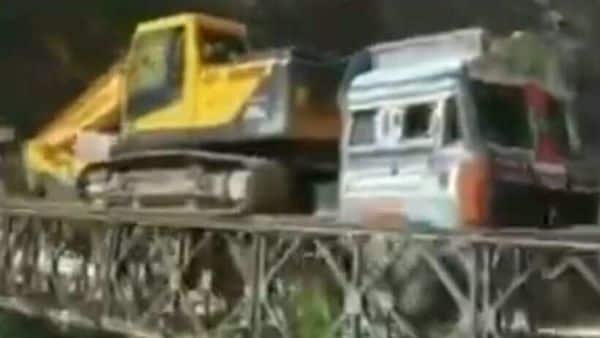 Screenshot from a video posted by ANI shows a truck just before it fell into a gorge after the bridge here collapsed.