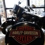 The logo of Harley-Davidson is seen on one of their models at a shop. (REUTERS)