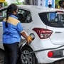 File photo of a pump attendant filling fuel in a car. (PTI)