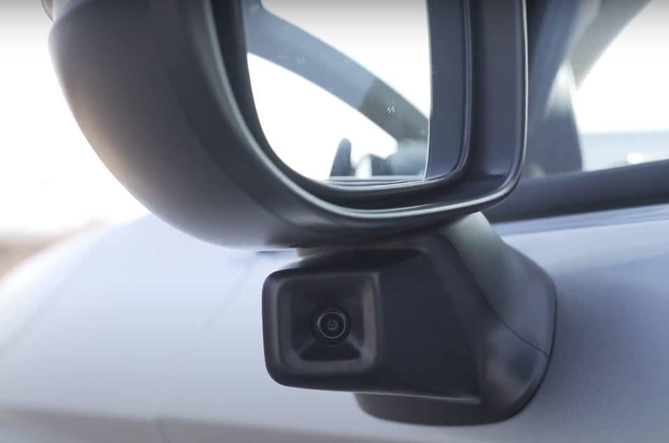 A camera under the left side mirror provides live feed to the center console whenever the left indicator is activated. This is a neat safety feature to eliminate risks from blind spots.