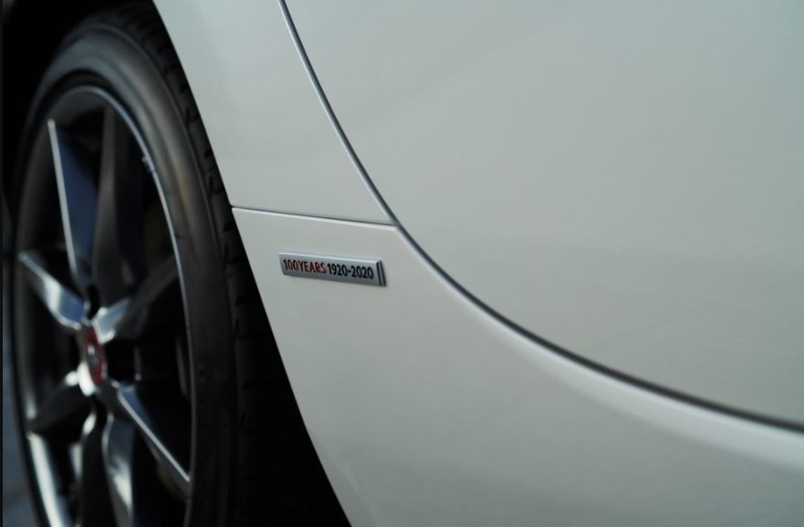 Commemorative anniversary badge sits on the front fender of special edition Mazda MX-5 Miata