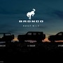 A lineup of 2021 Ford Broncos, along with the logo, are displayed in this photo. (via REUTERS)