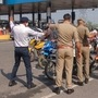 Police force bikers to go back after they could not show their passes while entering Noida. (File photo) (PTI)