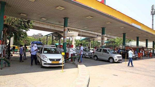 Vehicle line up for CNG filling at a pump station in New Delhi.