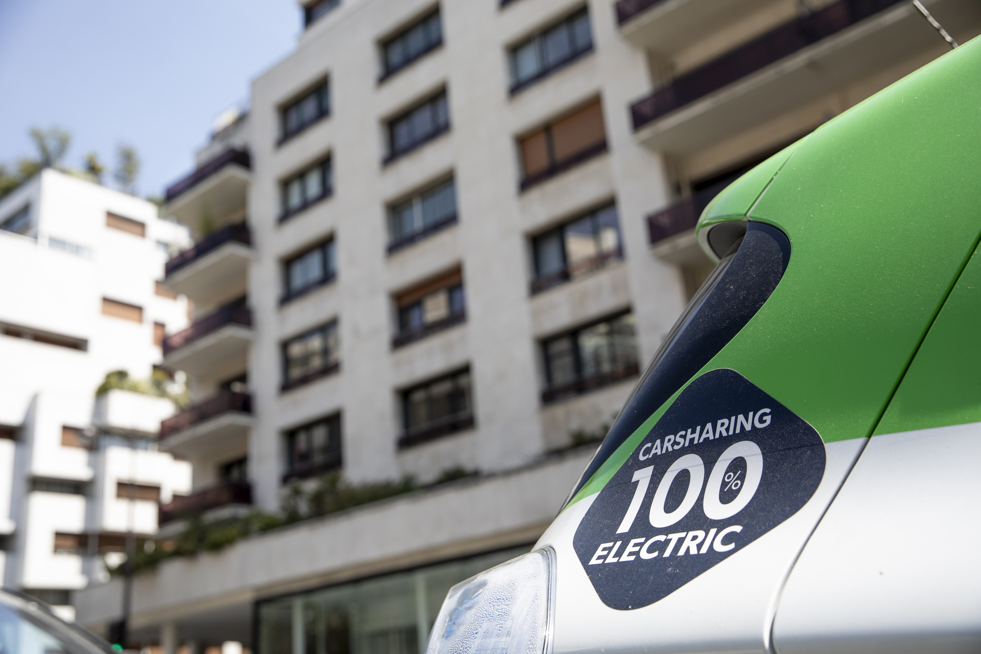 A Zity electric car-sharing hire automobile, operated by Renault SA, stands near residential apartments in Paris, France.