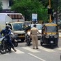 A police constable stops commuters at Vashi during an intensified lockdown by NMMC to curb the spread of coronavirus in Navi Mumbai. (PTI)