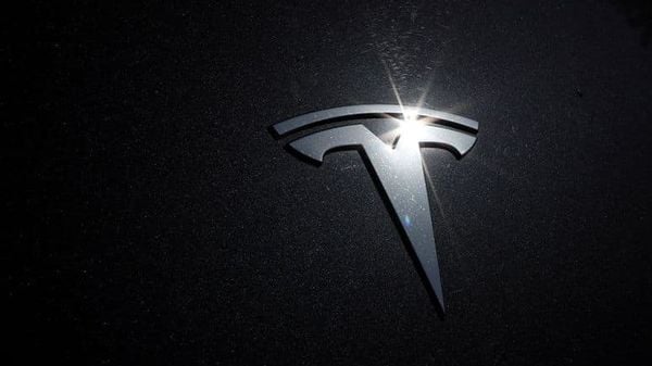 The Tesla logo is seen on a car in Los Angeles, California. (REUTERS)
