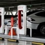 Tesla electric vehicles are charged at a Tesla Supercharger charging station. (File photo) (REUTERS)