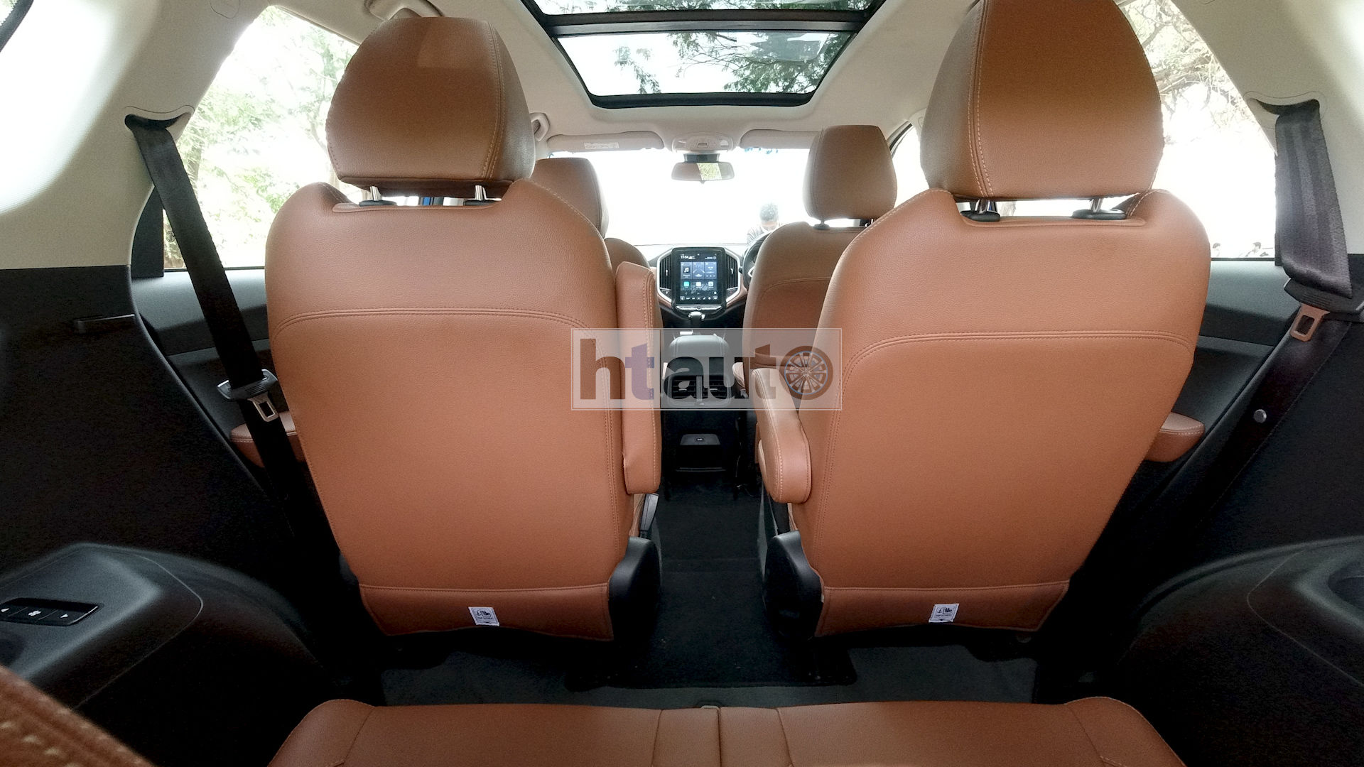 Third row does get cup holders and vents with dedicated speed controls but leg space is rather limited. Third row does get cup holders and vents with dedicated speed controls but leg space is rather limited.