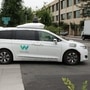 A Waymo self-driving car pulls into a parking lot at the Google-owned company's headquarters in Mountain View, California. (AFP)