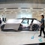 File photo: Cleaners are seen next to a self-driving electric concept car NIO Eve. (REUTERS)
