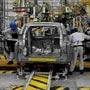 File photo of workers assembling a Mitsubishi Pajero at a Mitsubishi car factory. (REUTERS)