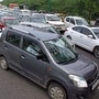 File photo - A view of a long queue of cars as UP Police checking curfew pass for the entry in Uttar Pardesh at Delhi-UP border.