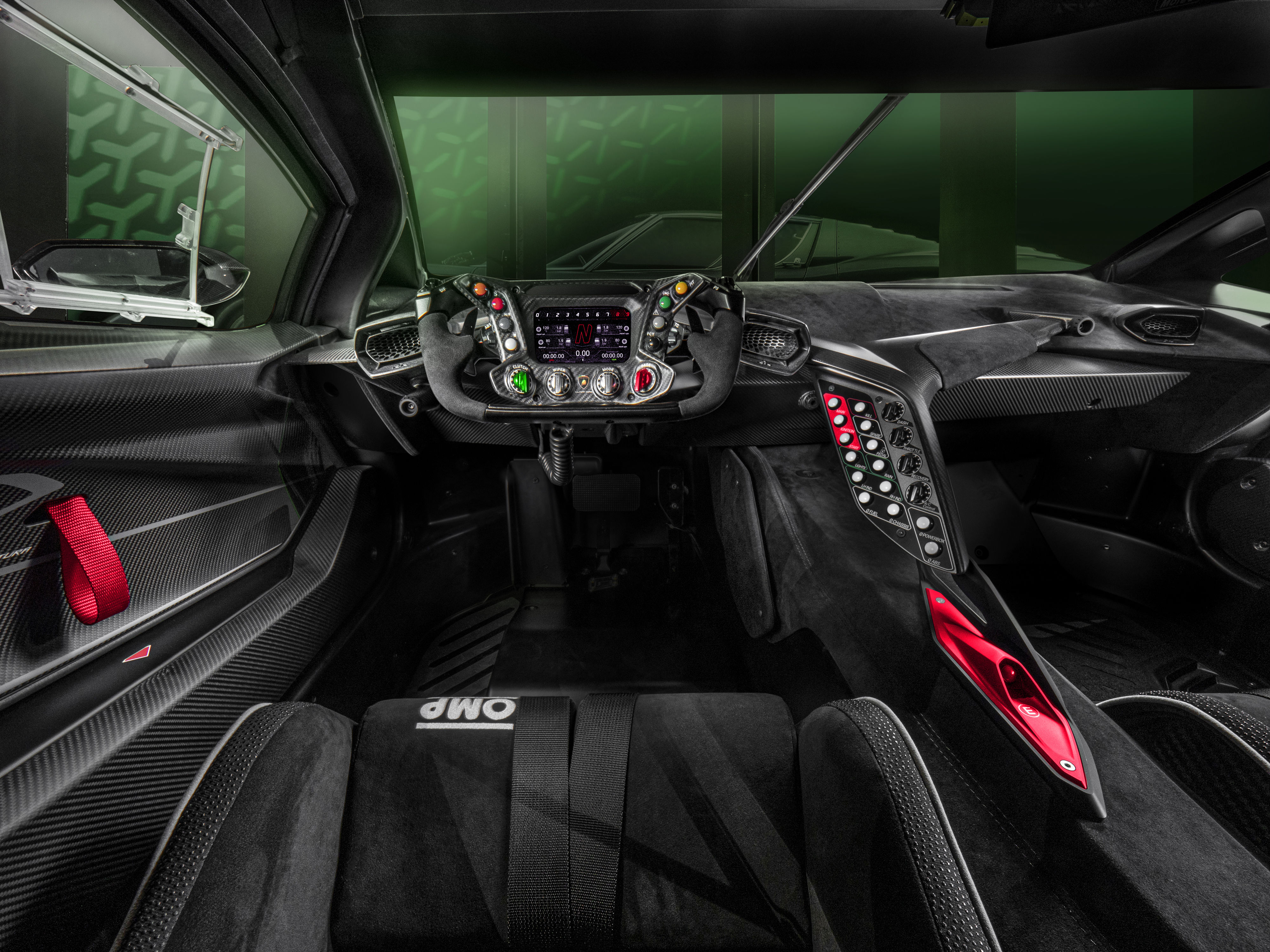 The cabin of Lamborghini Essenza SCV12 seeks to resemble more of a spaceship rather than even the conventional hypercars. The cabin of Lamborghini Essenza SCV12 seeks to resemble more of a spaceship rather than even the conventional hypercars.
