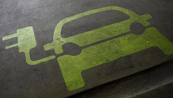 File photo for representational purpose - A sign is painted on a parking space for electric cars inside a car park in Hong Kong.