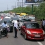 UP Police checking curfew pass for the entry in Uttar Pardesh at Delhi UP Border during the weekend lockdown, in Noida on Saturday. (ANI Photo)
