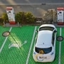 Electric vehicles sit parked in bays as they charge at an electric vehicle charging site in Germany. (Bloomberg)
