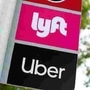 FILE PHOTO: A sign marks a rendezvous location for Lyft and Uber users at San Diego State University in San Diego, California. (REUTERS)