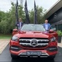 Mercedes India MD Martin Schwenk (right) posing with the newly launched 2020 GLS SUV in India,