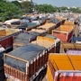 Trucks are seen parked during the nationwide lockdown amid coronavirus pandemic, in Kolkata.