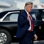 Donald Trump in front of his official ride The Beast