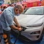 Delhi's Deputy Chief Minister Manish Sisodia during the inauguration of an electric vehicle charging station, at 11KV substation, Patparganj. (File photo) (PTI)