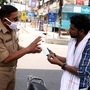 Police personnel interact with commuter in Noida. (File Photo)