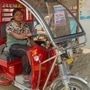 An e-rickshaw driver with SMV Green Solutions. (PTI)