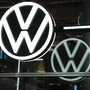 A Volkswagen (VW) logo sits on display in the visitors area of the Volkswagen AG e-Golf electric automobile factory in Dresden, Germany. (Bloomberg)