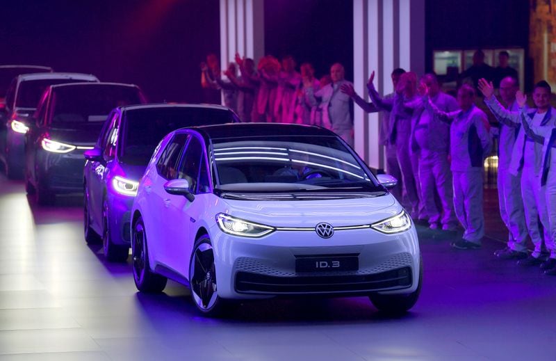 File photo - New cars drive during a ceremony marking start of the production of a new electric Volkswagen model ID.3 in Zwickau, Germany.