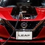 FILE PHOTO: A charging cable is attached to a Nissan Leaf electric car at the Tokyo Motor Show. (REUTERS)