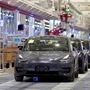 Tesla China-made Model 3 vehicles are seen during a delivery event at its factory in Shanghai. (File photo) (REUTERS)