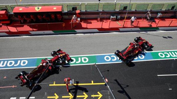 Ferrari's Charles Leclerc and Ferrari's Sebastian Vettel during qualifying. (Pool via REUTERS)