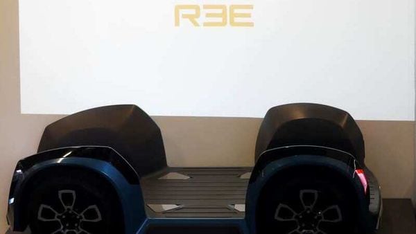 A prototype of a platform by Israel's REE Automotive, developers of a rolling chassis for electric vehicles, is seen near their logo at their offices in Tel Aviv. (REUTERS)