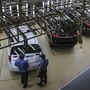 Workers on an assembly repair line at the Innova Crysta compact multi-purpose vehicle (MPV) production line at the Toyota Kirloskar Motor plant in Bidadi, Karnataka. (Bloomberg)