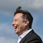 File photo - Technology entrepreneur Elon Musk laughs as he visits the Tesla Gigafactory construction site in Gruenheide near Berlin. (AP)