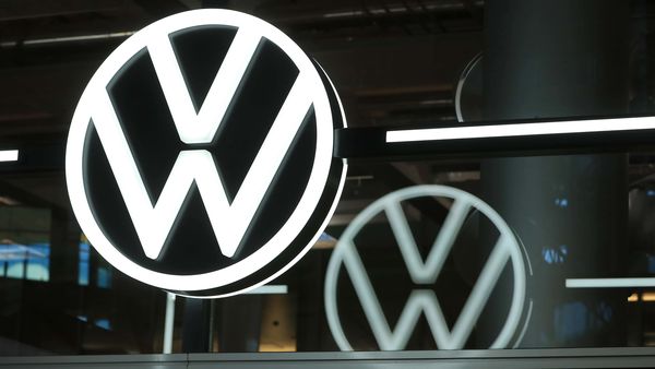 A Volkswagen (VW) logo sits on display in the visitors area of the Volkswagen AG e-Golf electric automobile factory in Dresden, Germany. (Bloomberg)