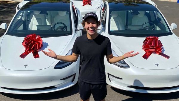 Photo shared by YouTube influencer with Tesla Model 3 cars to be given away in an online drive to register voters for the upcoming US presidential elections. (Photo courtesy: Twitter/@DavidDobrik)