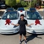 Photo shared by YouTube influencer with Tesla Model 3 cars to be given away in an online drive to register voters for the upcoming US presidential elections. (Photo courtesy: Twitter/@DavidDobrik)
