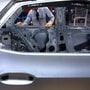An employee carries out quality checks on a chassis on the assembly line in the Volkswagen AG (VW) ID.3 electric automobile factory in Zwickau, Germany. (File photo used for representational purpose) (Bloomberg)